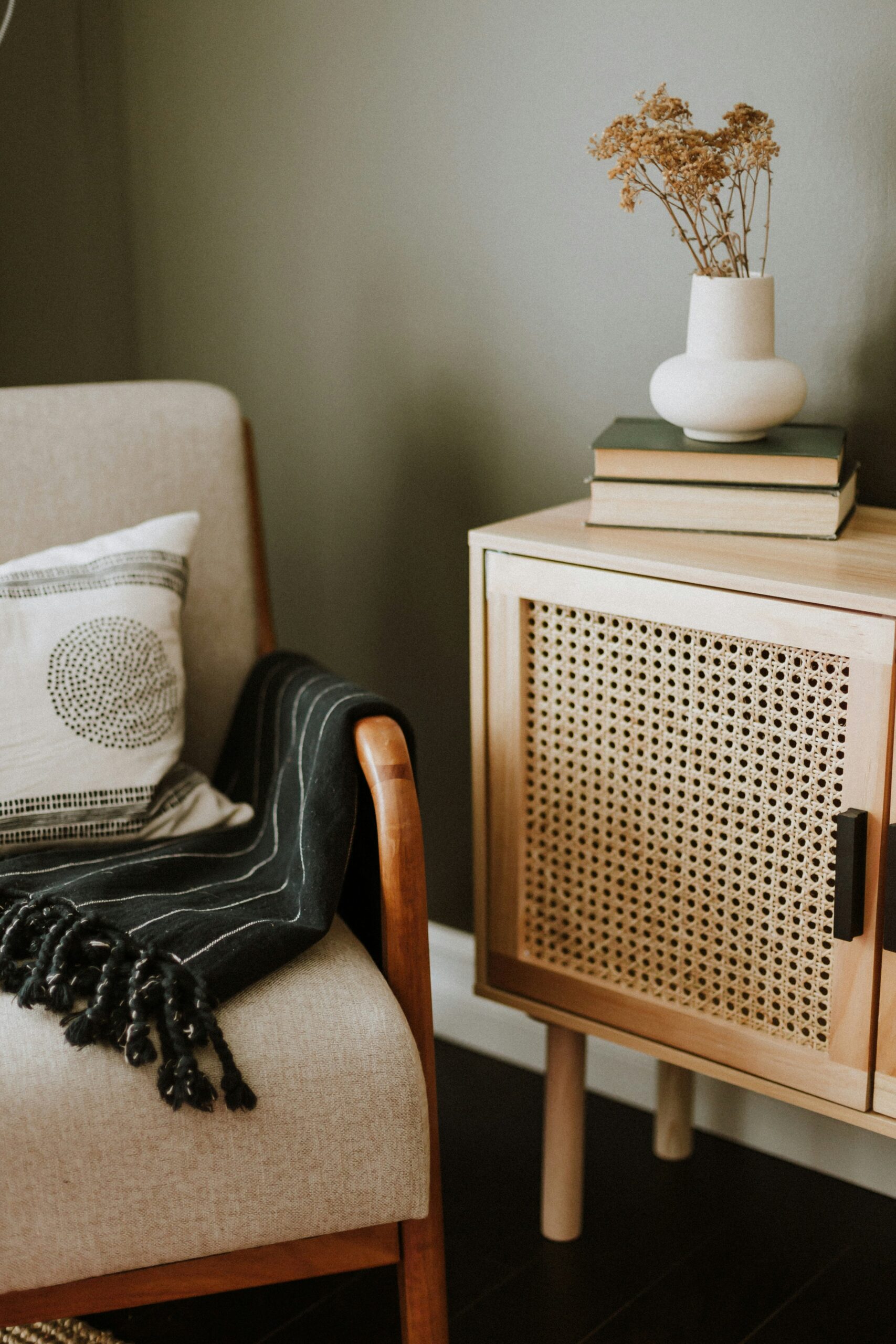 Plywood cane cabinet used in a modern living room interior setup
